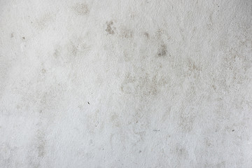 Old gray concrete wall with scuffs and putty primer, texture background