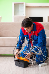 Electrician contractor with tangled cables