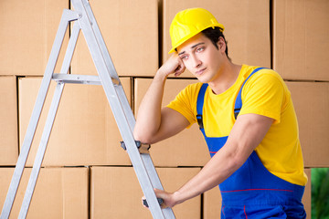 Man contractor working with boxes delivery