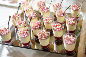 Glass display stand with individual desserts