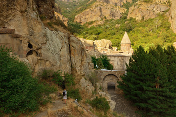Fototapeta na wymiar Geghard monastery near Yerevan is a medieval monastery in the Kotayk province of Armenia, being partially carved out of the adjacent mountain. GARNI, ARMENIA 