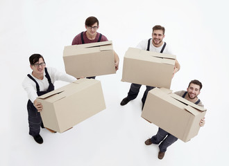 Young movers holding boxes isolated on white background,