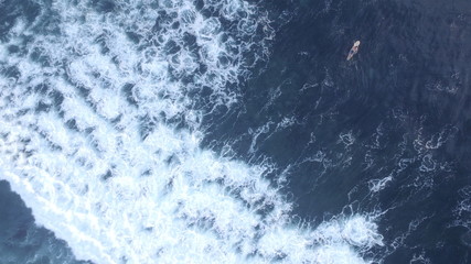Surfing Uluwatu beach Bali, Indonesia