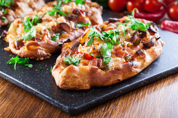 Traditional Turkish pide with meat and vegetables