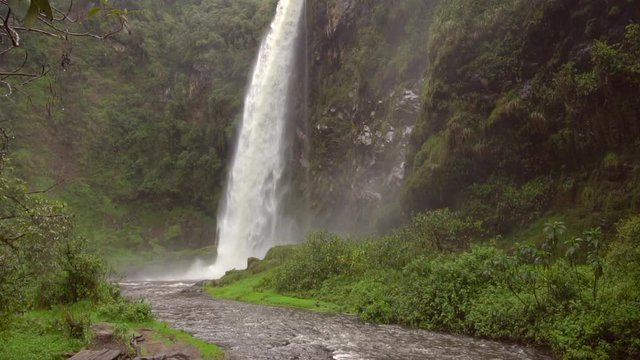 Condor Machay Waterfall slow motion. In the Rio Pita Valley near Cotopaxi Volcano, Ecuador