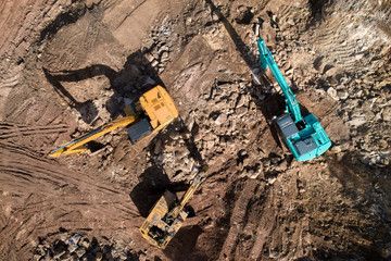 Aerial view of earth work machine at construction site