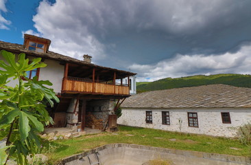 Old houses in the historical cultural reserve village of Dolen, Bulgaria. Dolen is famous with its 350 old houses – an example of 19th century Rhodopean architecture.