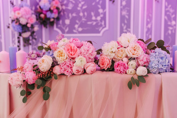 Wedding flowers, decoration made of roses, peonies and decorative plants, close-up, selective focus