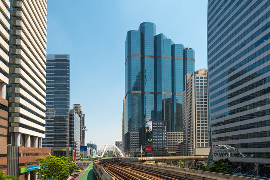 Skytrain and skyscraper in the central business district of the metropolis Bangkok