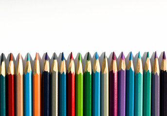 Colored Pencils on White Background in a Row