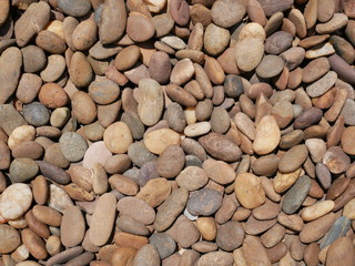 background of smooth stones in garden