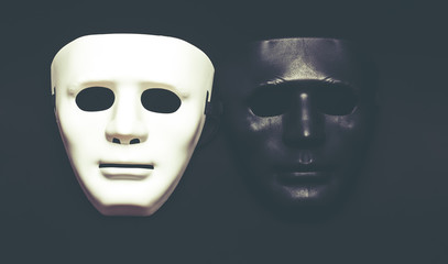 White and dark human masks