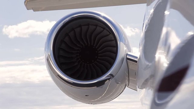 Closeup high detailed view turbo engine rotation of airplane at airport