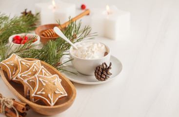 Christmas table setting with ginger cookies and cocoa. Christmas background concept.