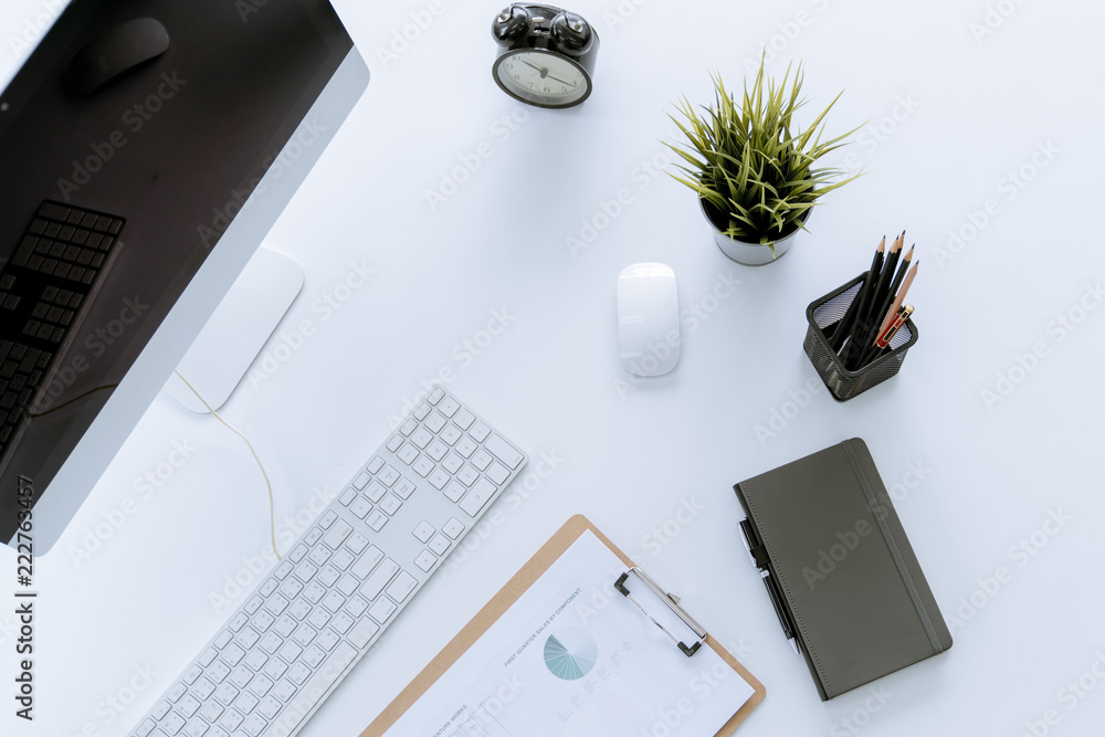 Poster flat lay of top view modern white desk work table with computer laptop and stationary in home office