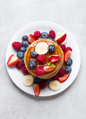 Delicious pancakes with fruit