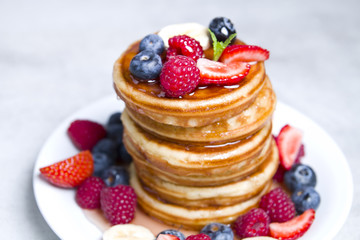 Delicious pancakes with fruit