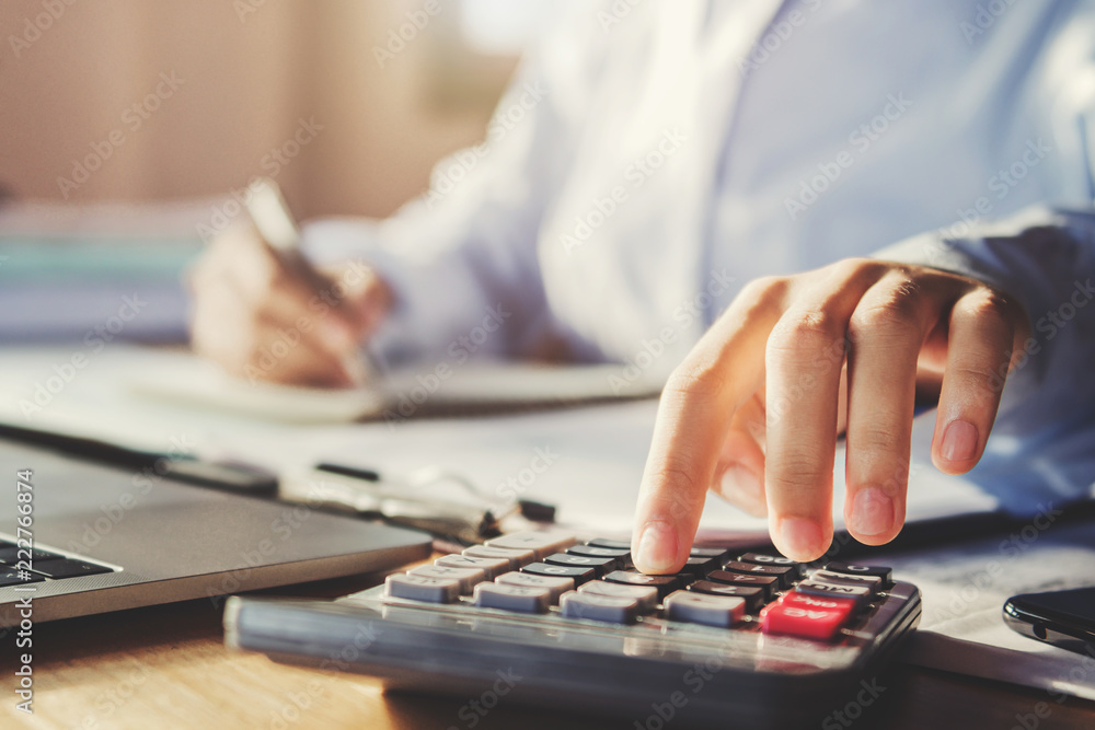 Poster business man working in office and using calculator with pen