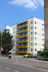 Typical modernized residential buildings in Leipzig city center with blue sky, architecture from the GDR from the 70s and 80s of the last century