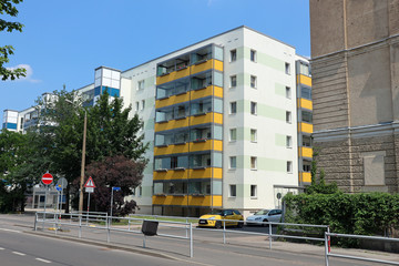 Typical modernized residential buildings in Leipzig city center with blue sky, architecture from the GDR from the 70s and 80s of the last century