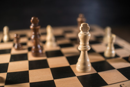 Chess on chessboard close up