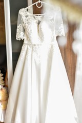 Fototapeta na wymiar bride's morning, wedding dress