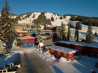 Aerial photo of skiing resort an sunrise