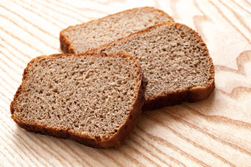 sliced Bread on wooden surface