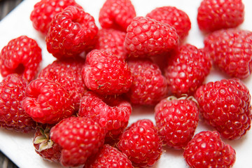 Fresh and sweet raspberries background