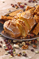 Cupcake with almond cookies , nuts and dried fruits