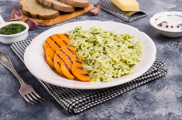 Roast slices of pumpkin with pasta
