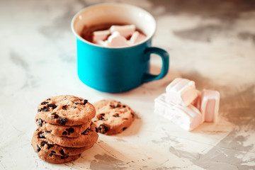 cocoa with cookies on the table