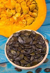Pumpkins on rustic blue background. Autumn background.