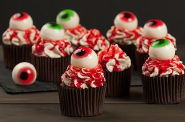 Halloween Cupcakes With Eyeballs. Blood Topping. Home Baked.