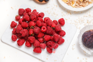 Fresh and sweet raspberries background