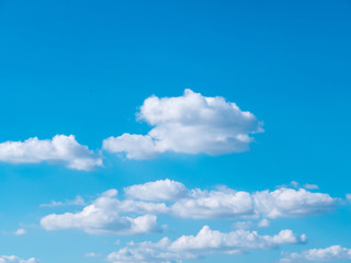 Light in the clouds on blue sky, The stormy and fluffy clouds shined from above with the sunlight, view from airplane Windows.