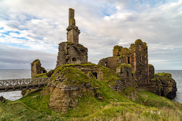 Castle Sinclair Girnigoe from Sinclair`s Bay. The medieval and renaissance fortress is the most spectacular ruin in the North of Scotland, in the Highlands near Wick and Caithness