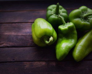 green bell pepper on wooden table
