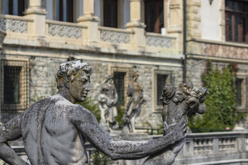 Fototapeta na wymiar sculptures in the garden of the Peles Palace, the former summer residence of the Kings of Romania