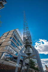 View of the construction crane in the Hamburg Hafencity. HafenCity quarter in the district of Hamburg Mitte on the Elbe river island Grasbrook.