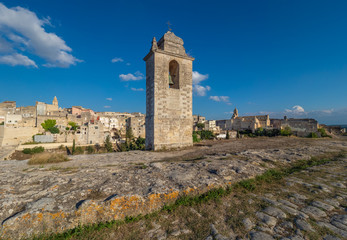 Fototapeta na wymiar Gravina in Puglia (Italy) - The suggestive old city in stone like Matera, in province of Bari, Apulia region. Here a view of the historic center.