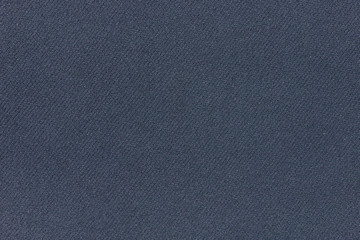 Dark blue fabric background texture. Detail of linen textile material