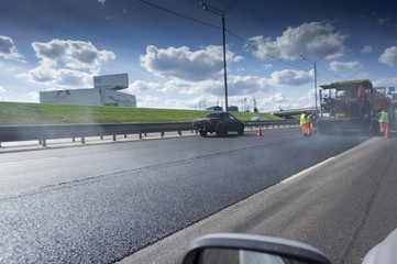 road construction works on the highway with heavy traffic