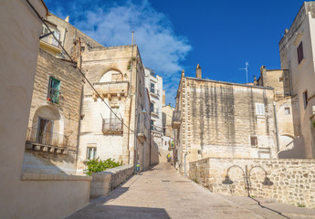 Fototapeta na wymiar Gravina in Puglia (Italy) - The suggestive old city in stone like Matera, in province of Bari, Apulia region. Here a view of the historic center.