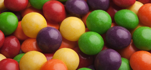 Colorful bonbons assortment, tasty background