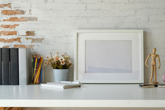 Mockup artist workspace with white frame and copy space.