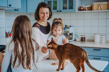 Happy family having fun in the kitchen