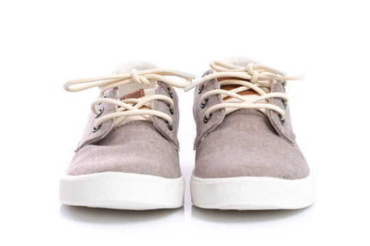 Close Up Of Kids Sneakers On White Background