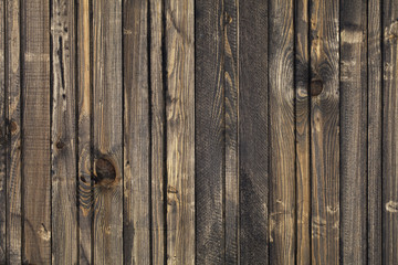Close up of dark rustic wall made of old wood table planks texture. Rustic brown wood table texture background template for your design.