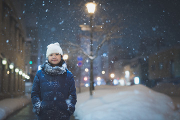 Beautiful asian girl girl in a night city snowflake ,Aomori Japan